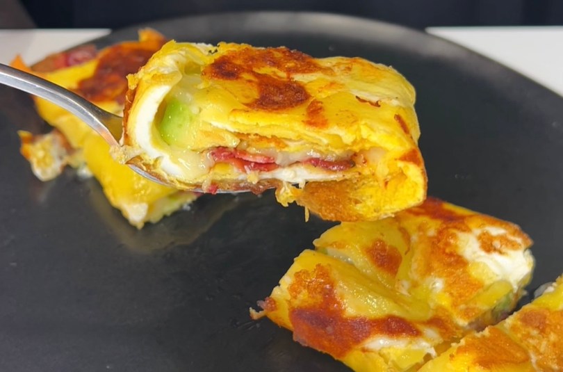 Crispy delicious potato egg cheese breakfast burrito roll